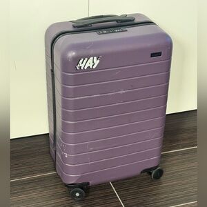 Away Purple Hard-Shell Carry-On Spinner Luggage